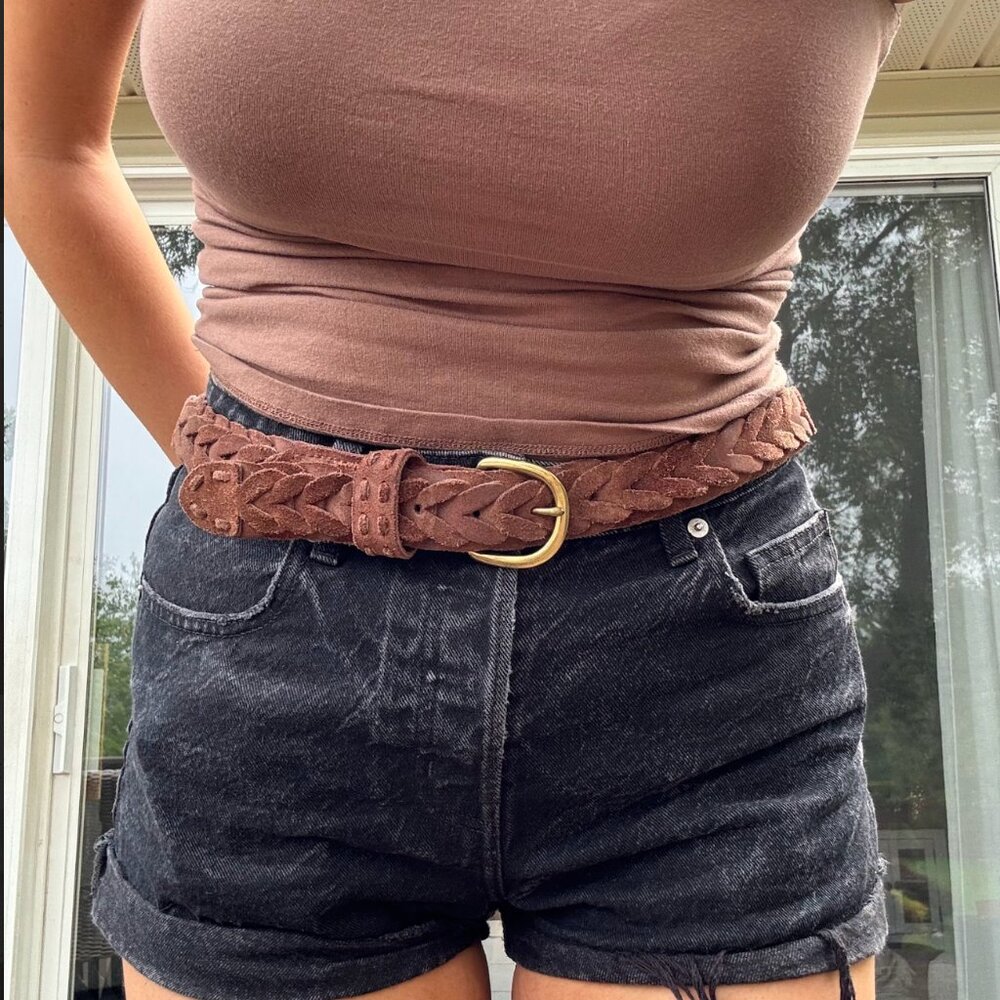 Vintage brown suede belt featuring a woven design and stitched patchwork details
